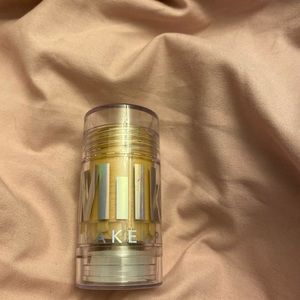 Full sized milk makeup highlighter in “Mars”